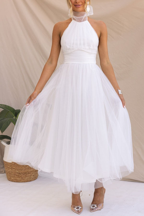 Elegant White Maxi Dress for Women – Flattering Halter Neck, Flowing Silhouette, Perfect for Weddings and Parties 12