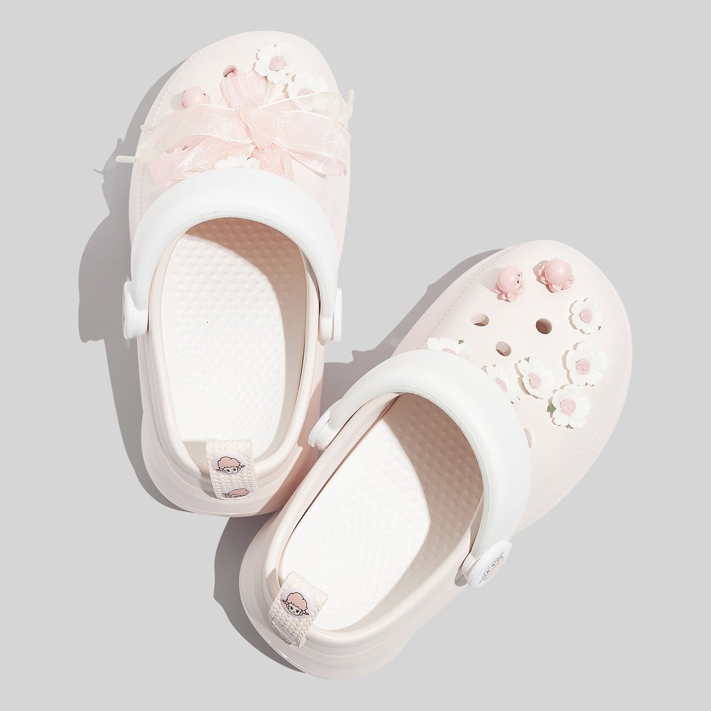 Women's Fashionable Pink Clogs With Playful Appliqués